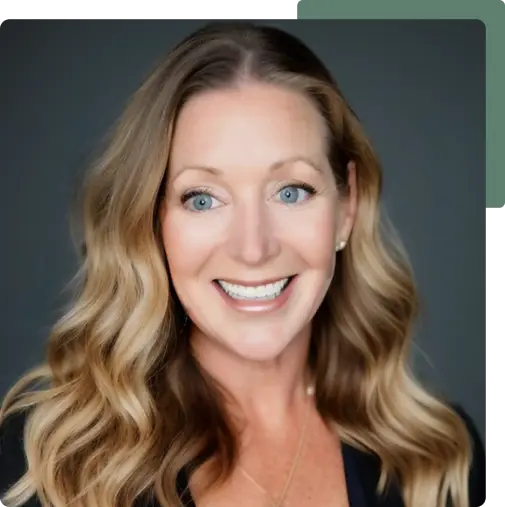 Smiling businesswoman with long blonde hair, showcasing a proven track record in revenue growth consulting.